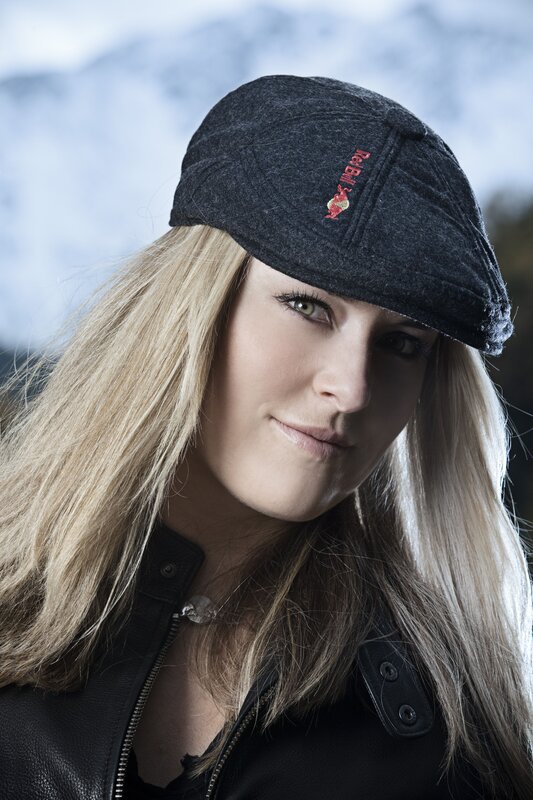 woman in black cap and jacket