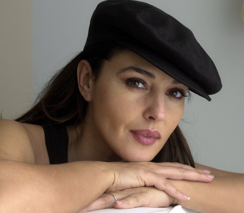 woman in black cap resting arms