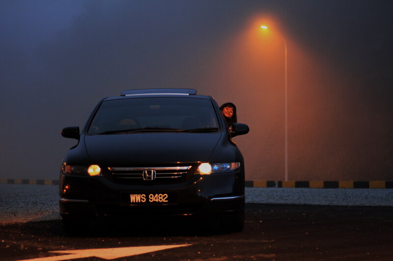 Woman in Black Car — Dramatic, Night