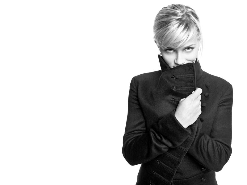 woman in black coat