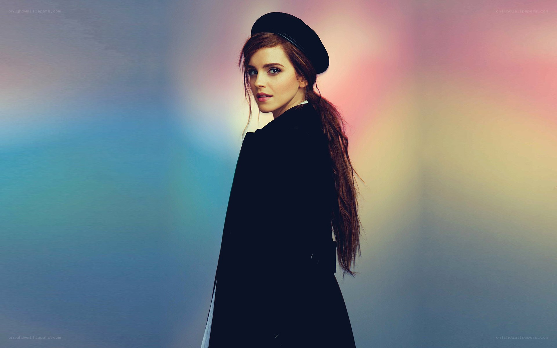 woman in black coat and hat
