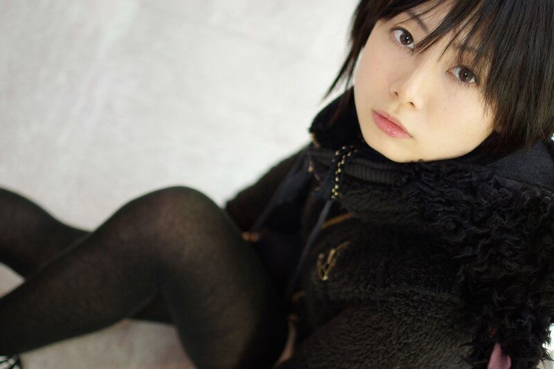 woman in black coat and tights
