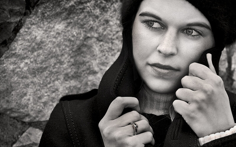 Woman in Black Coat — Contemplative