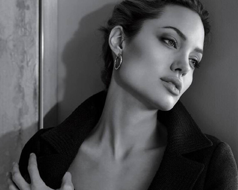 Woman in Black Coat — Dramatic, Photograph, Earring, Wall