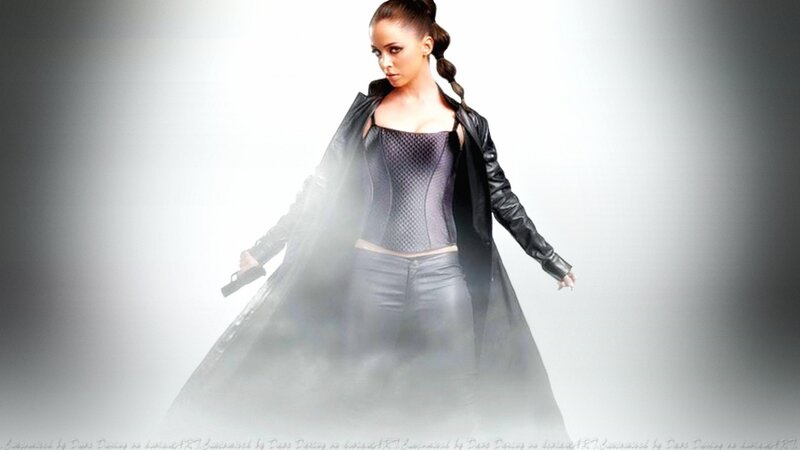 Woman in Black Coat — Dramatic, Photograph, Gun