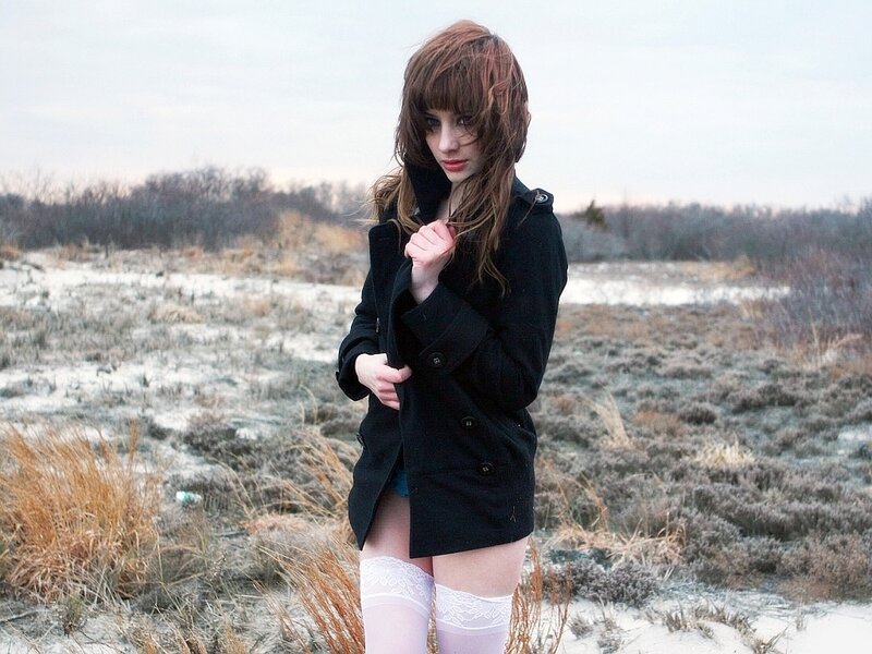 Woman in Black Coat — Dramatic