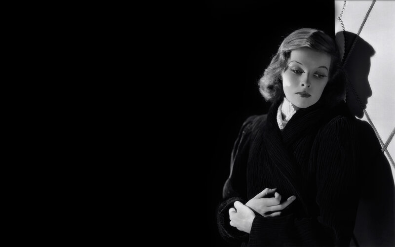 woman in black coat portrait