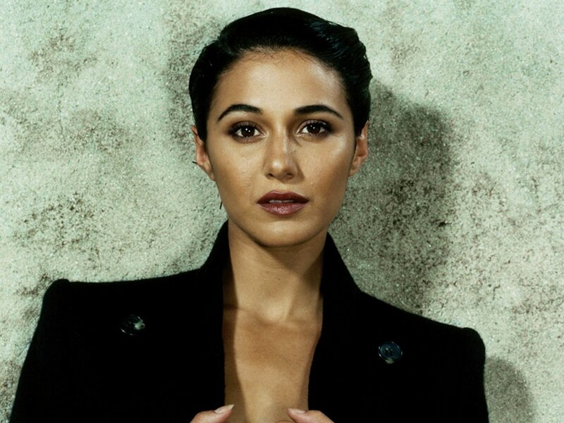 Woman in Black Coat — Serious, Photograph, Wall