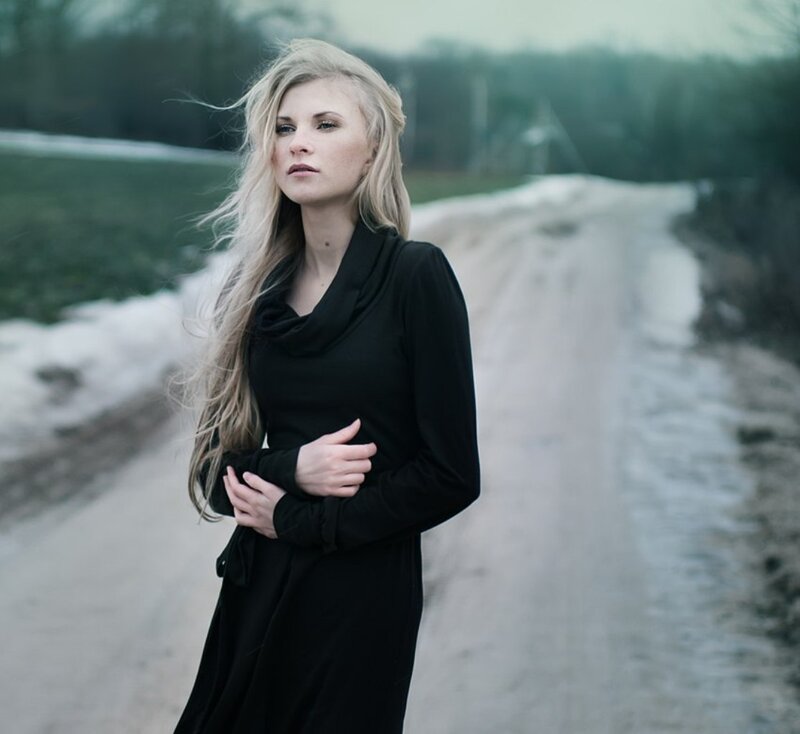 Woman in Black Coat — Somber, Winter