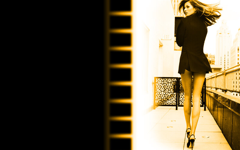 Woman in black coat walking