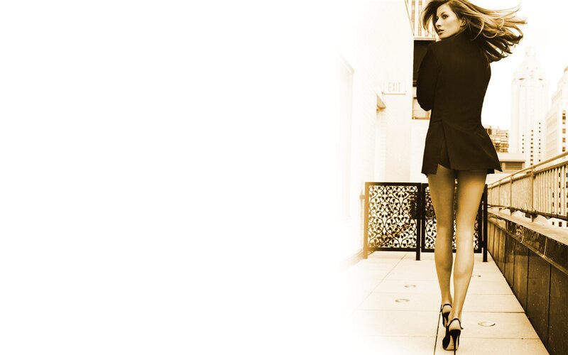 woman in black coat walking