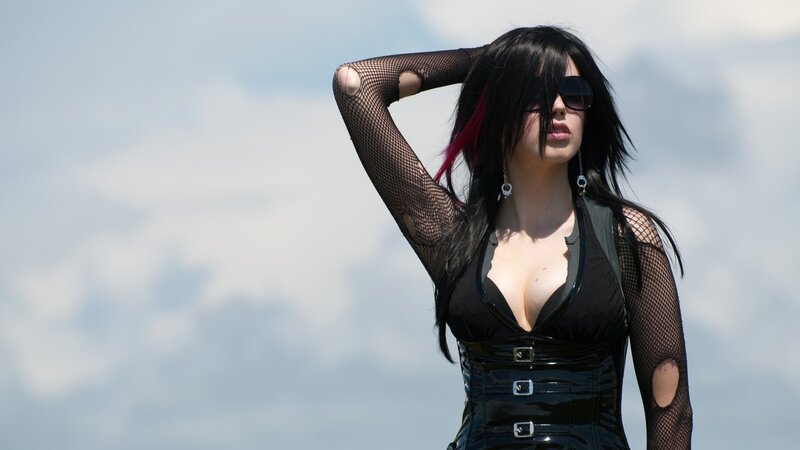 woman in black corset and fishnet