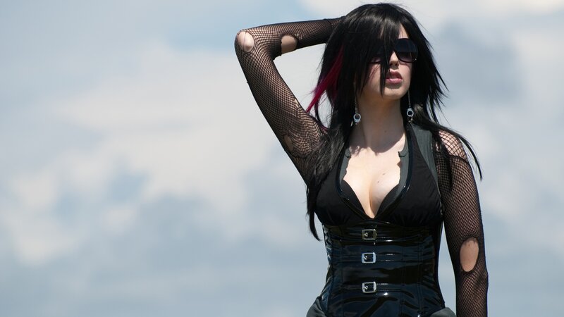 woman in black corset and fishnet