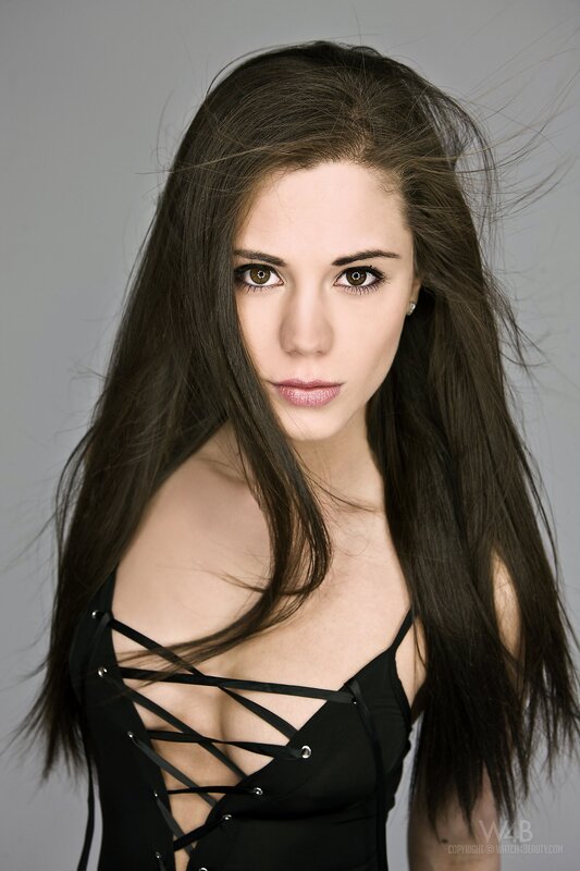 woman in black corset top