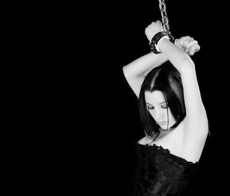 woman in black corset with chains