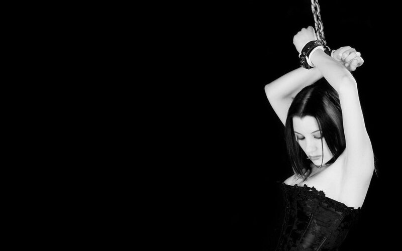 woman in black corset with chains