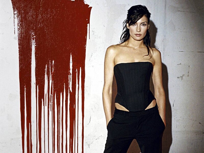 woman in black corset with red paint