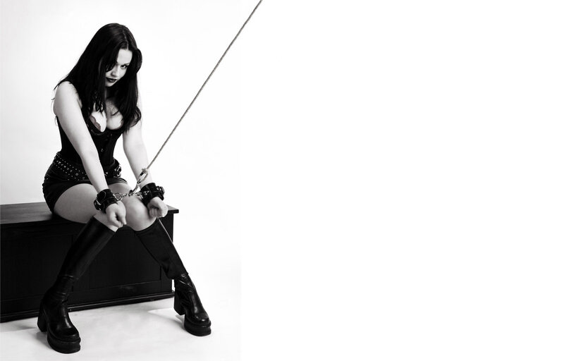 woman in black corset with rope
