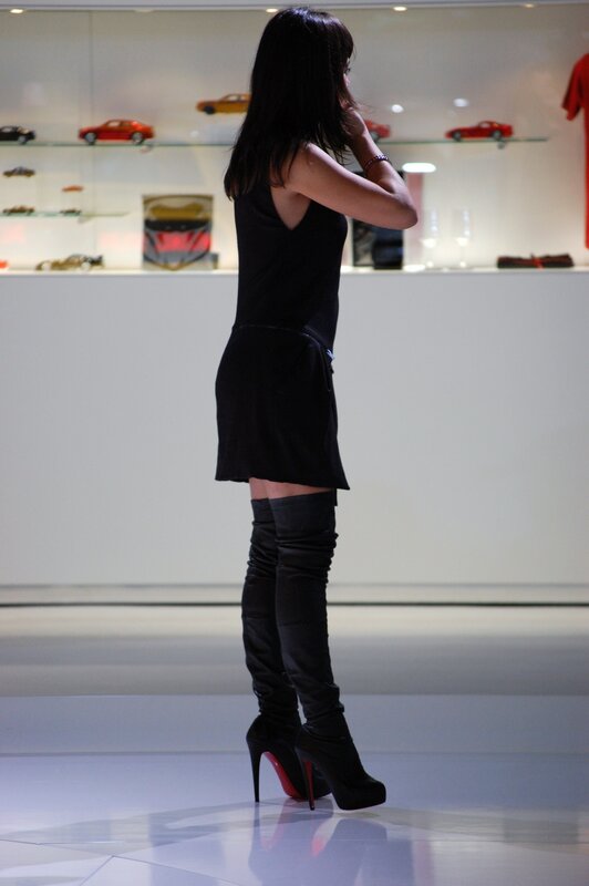 Woman in black dress and boots