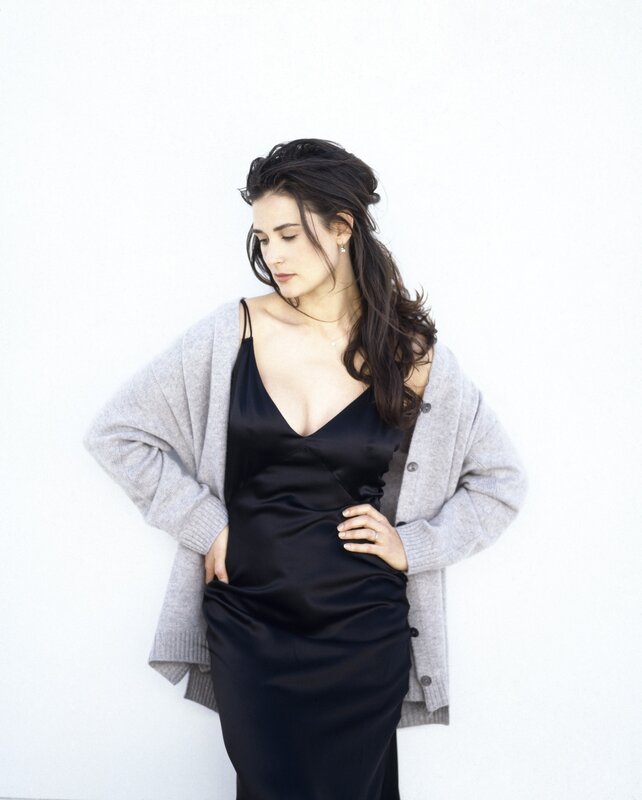 woman in black dress and cardigan