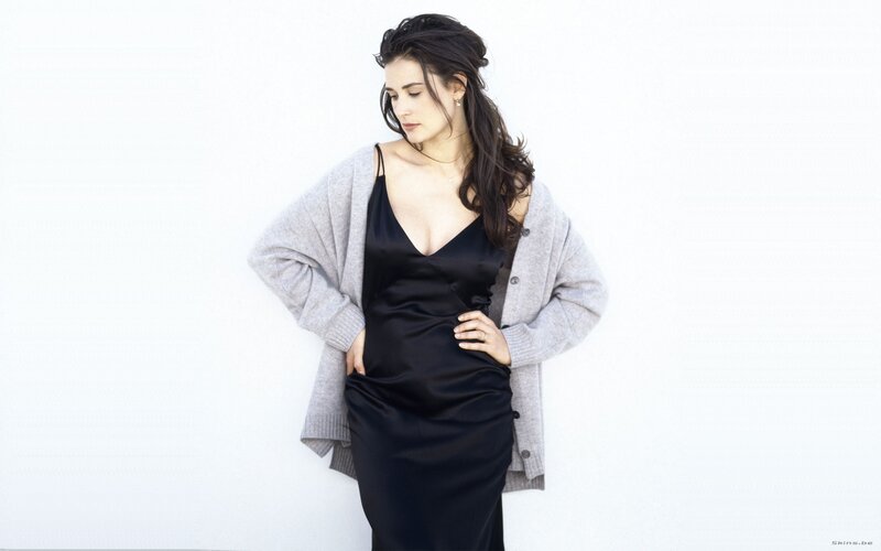 woman in black dress and cardigan