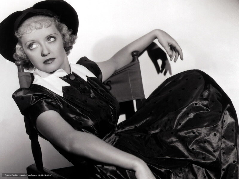 woman in black dress and hat