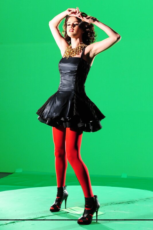 woman in black dress and red tights
