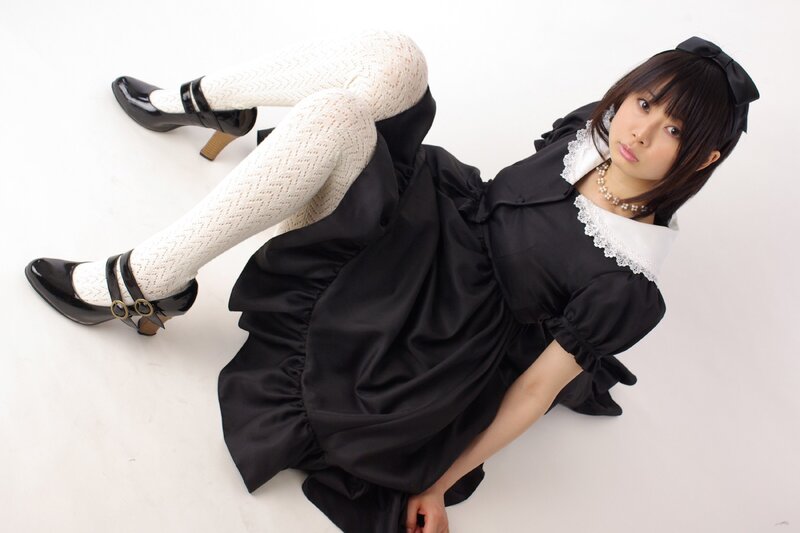 woman in black dress and white tights
