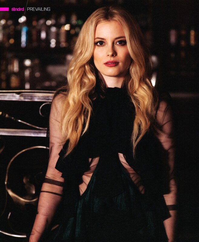 woman in black dress at bar