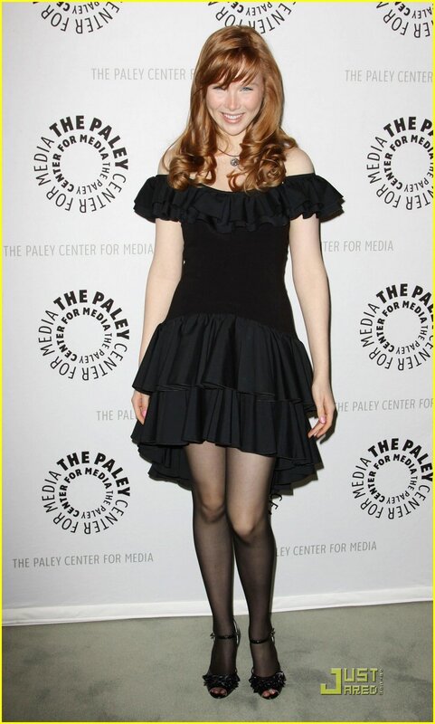 woman in black dress at event