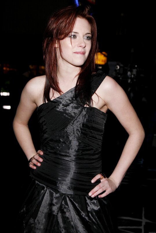 woman in black dress at event