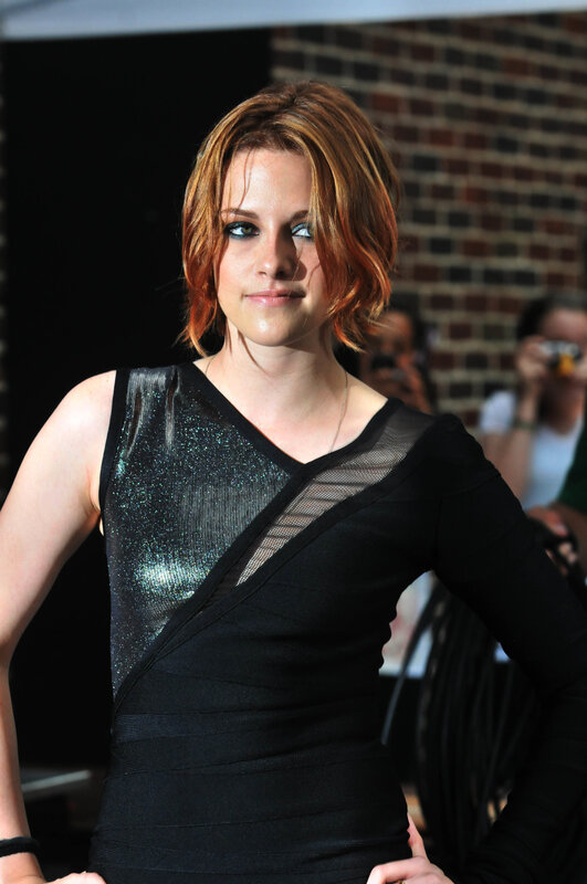 woman in black dress at event