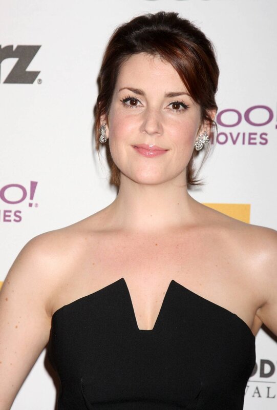 woman in black dress at event