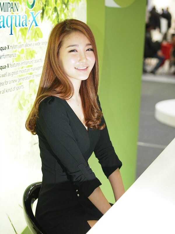 woman in black dress at event