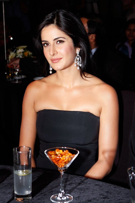 woman in black dress at event