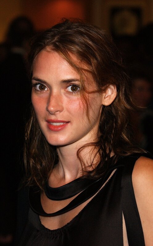 woman in black dress at event