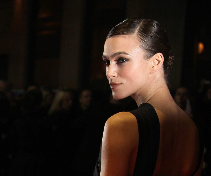 woman in black dress at event