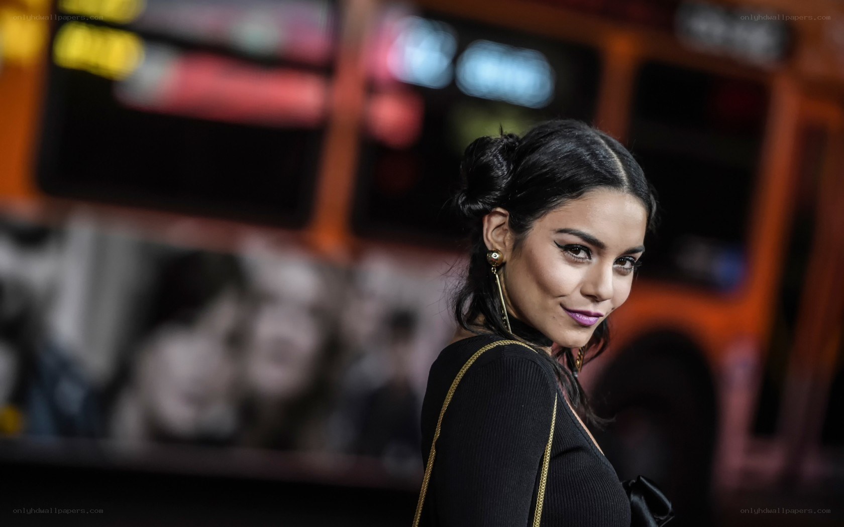 woman in black dress at event