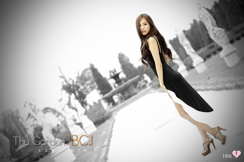 Woman in black dress at garden