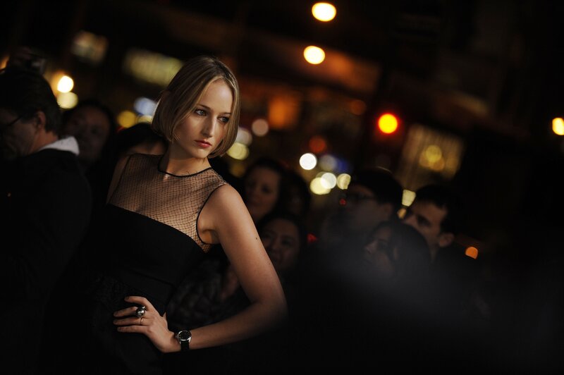 woman in black dress at night