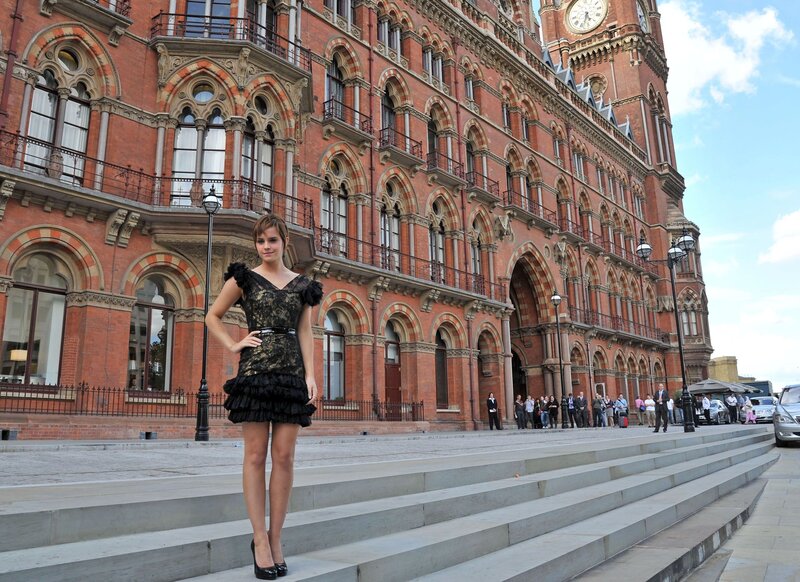 Woman in black dress at St Pancras