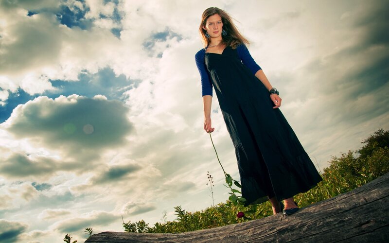 Woman in Black Dress — Blue, Dramatic, Afternoon, Photograph, Clouds