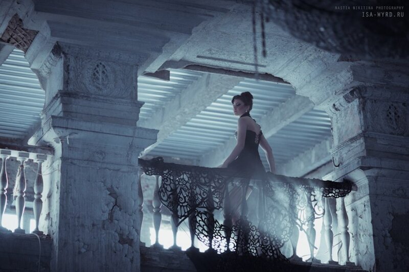 Woman in Black Dress — Blue, Dramatic, Photograph, Balcony