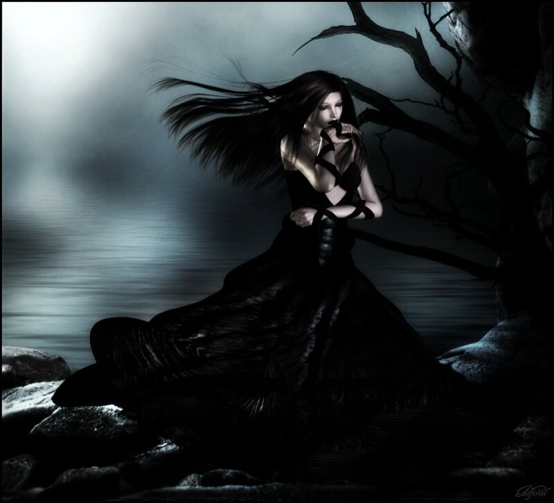 woman in black dress by water