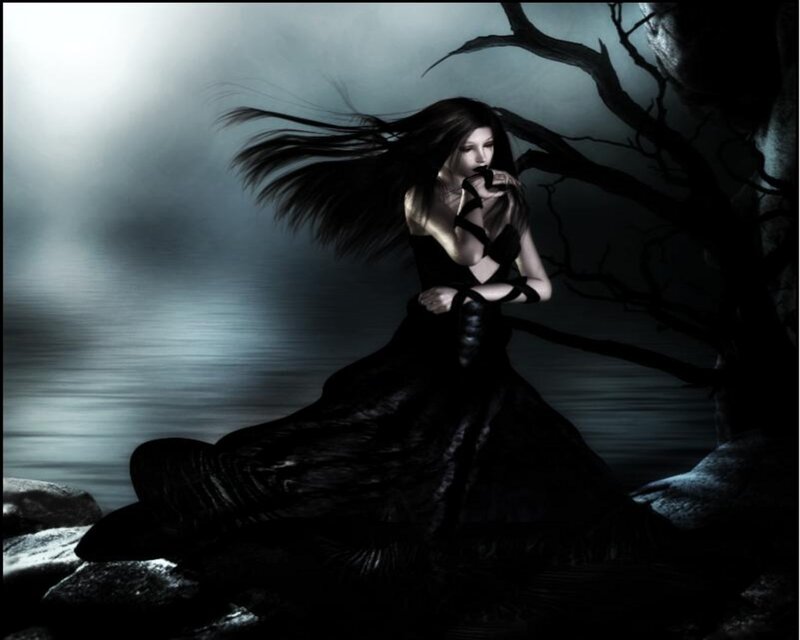 woman in black dress by water
