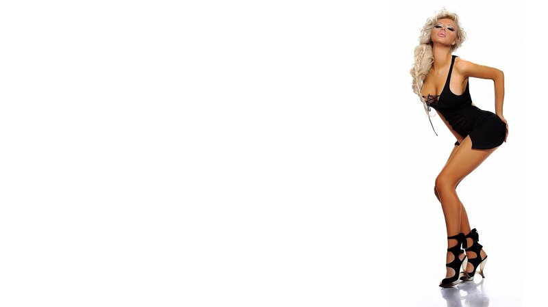 Woman in Black Dress — Confident, Photograph, Blonde Hair, High Heels, White Background