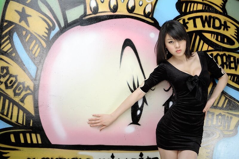 Woman in Black Dress — Confident, Photograph, Graffiti Wall