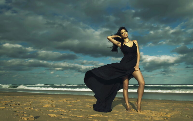Woman in Black Dress — Dramatic, Afternoon, Photograph, Beach