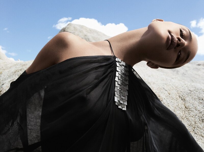Woman in Black Dress — Dramatic, Afternoon, Photograph, Necklace, Rocks, Blue