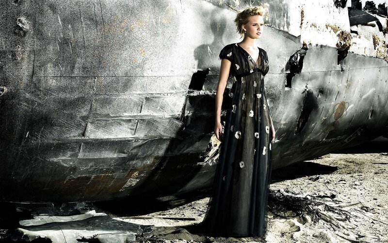 Woman in Black Dress — Dramatic, Afternoon, Photograph, Wrecked Ship
